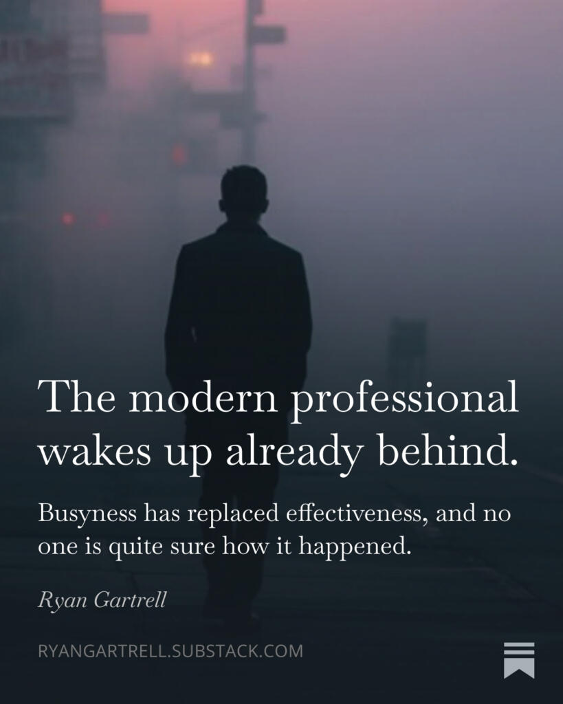 A solitary professional walking alone through a foggy city street at dawn, symbolizing modern work burnout and quiet inefficiency.
